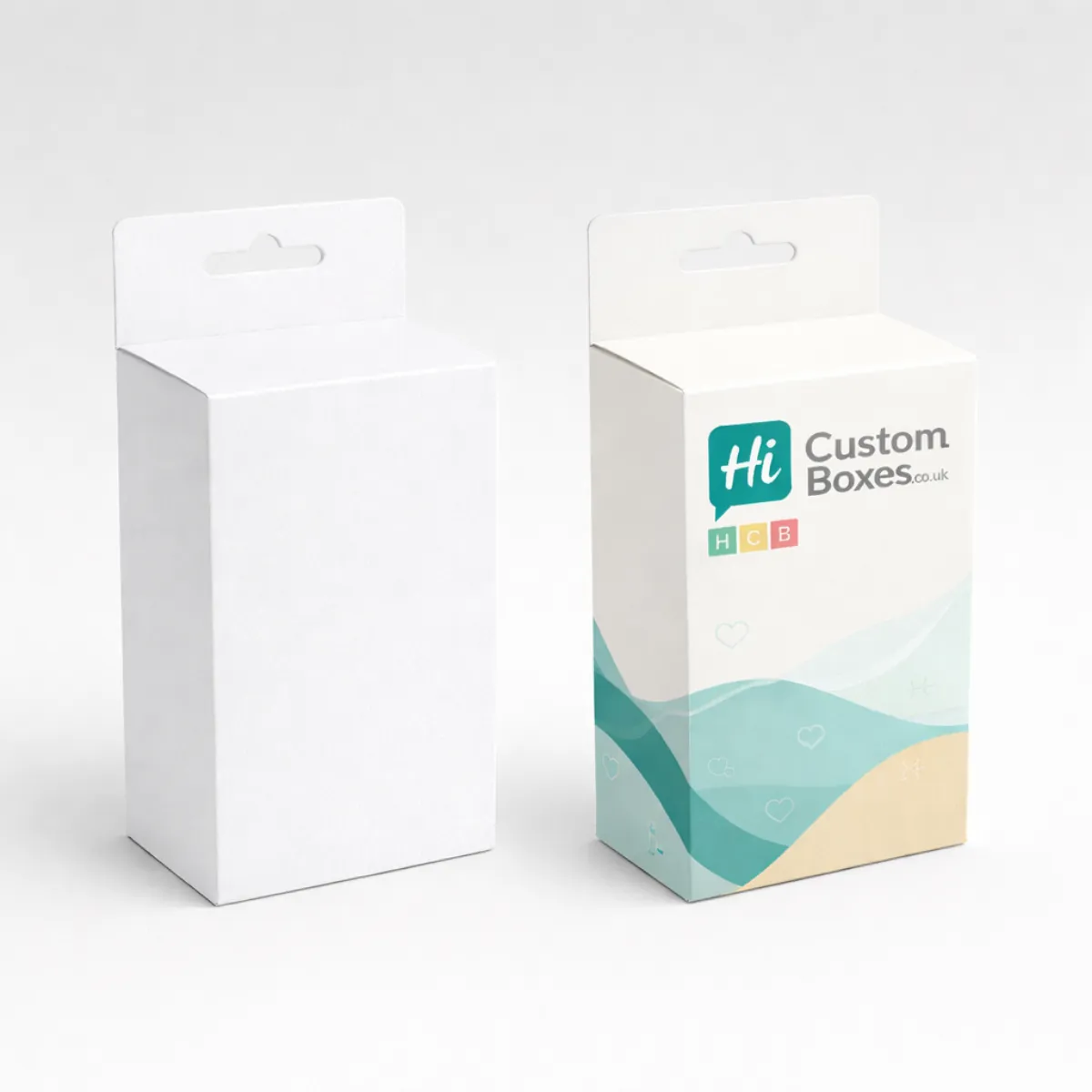 Two square white boxes- one plain and one printed with a circular window showing a garment-